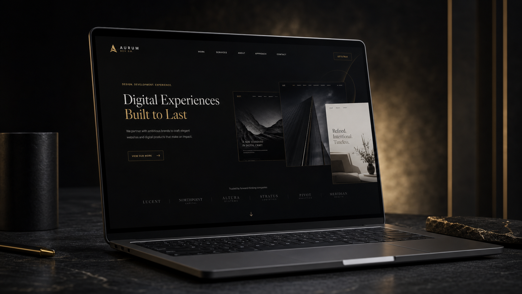 Premium web design studio website shown on a laptop